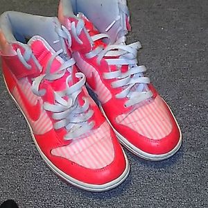 Pink and white Nikes